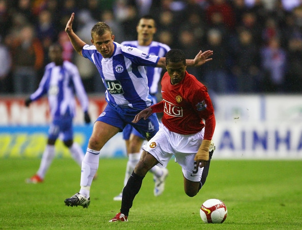 Manchester United's Patrice Evra in action against Wigan Athletic